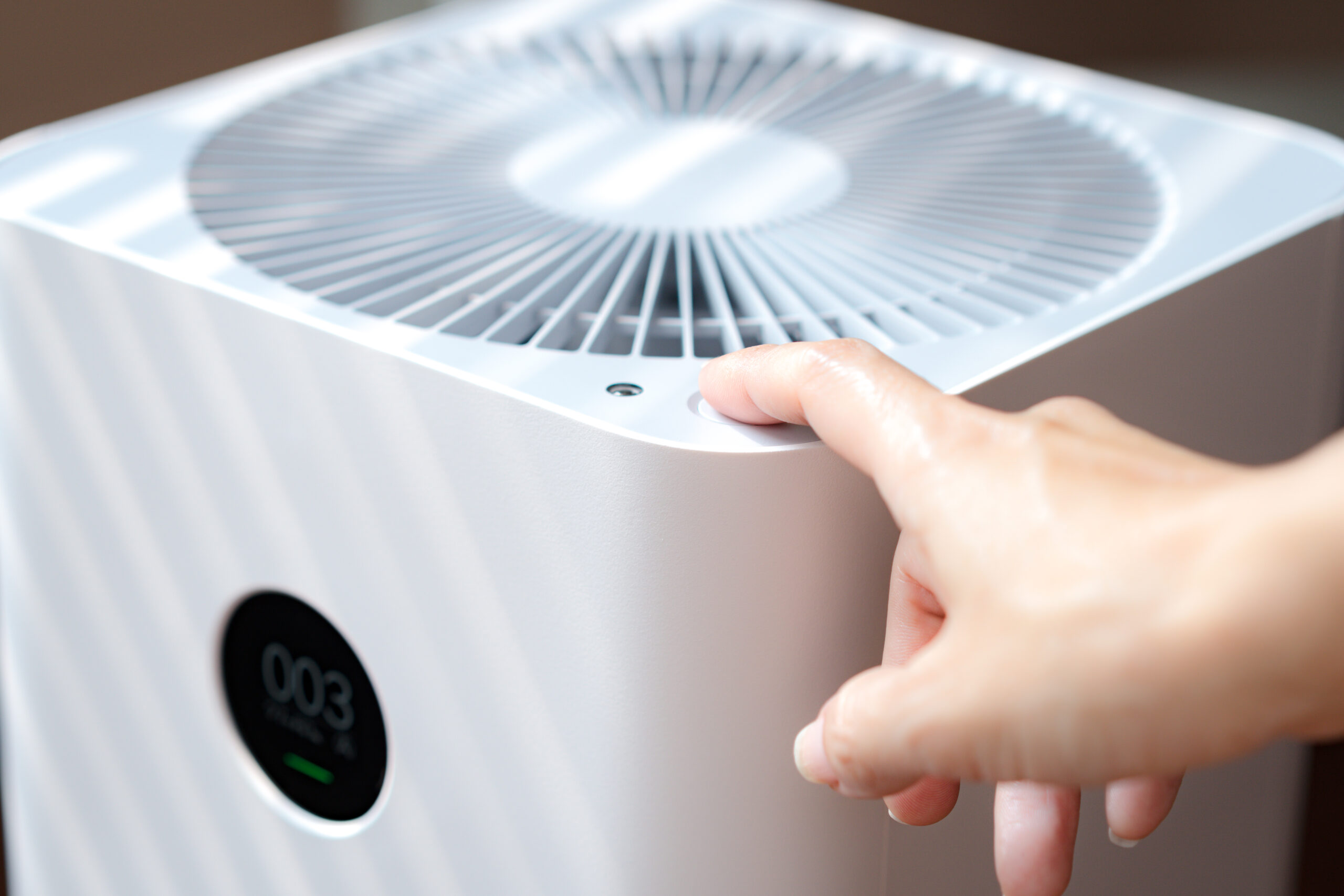 Closeup,Hand,Of,A,Woman,Press,The,Power,Button,Of