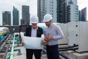 Engineer,Under,Checking,The,Industry,Chilled,Water,Fan,Coil,Unit